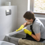 man-servant-cleaning-house